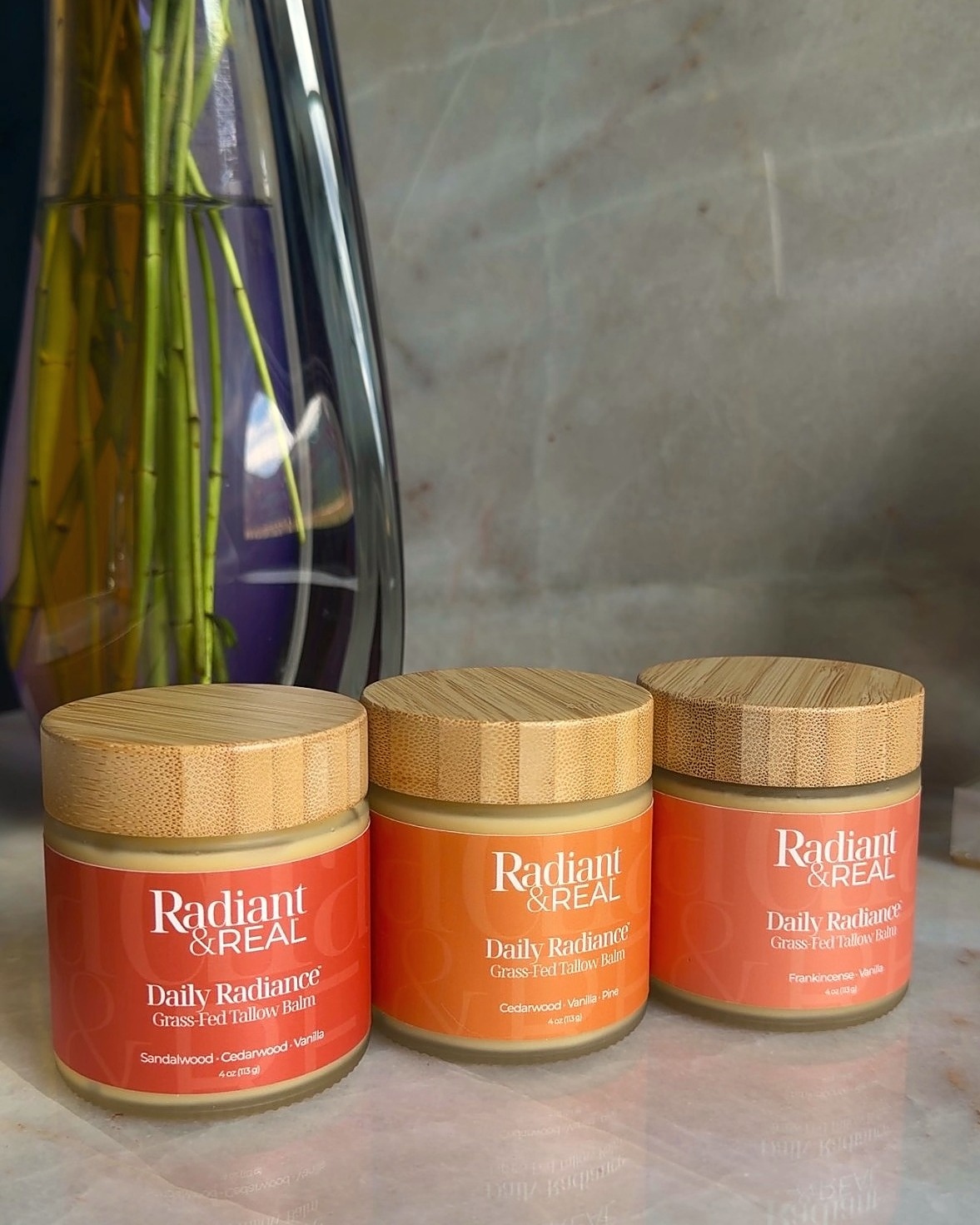 Three Radiant & Real Daily Radiance tallow balm jars